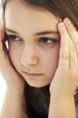 headshot of stressed teen