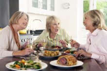 three women enjoying lunch