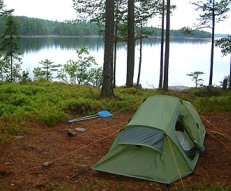 camping set-up by a lake