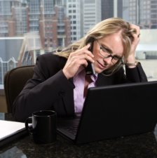woman feeling stressed at work